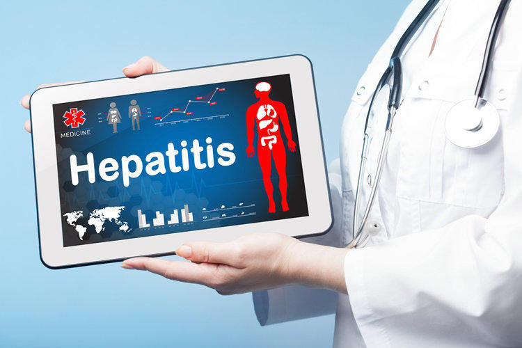 How does hepatitis C spread from person to person?